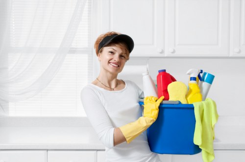 Sanitising shared office surfaces during commercial cleaning