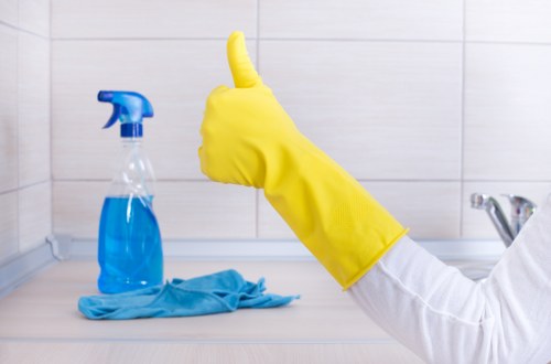 Cleaner preparing a Clapham flat for final inspection